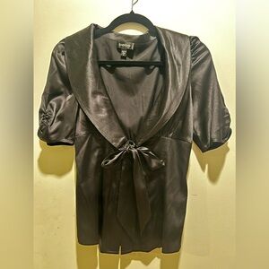 BEBE Satin bow blouse. New without tags.